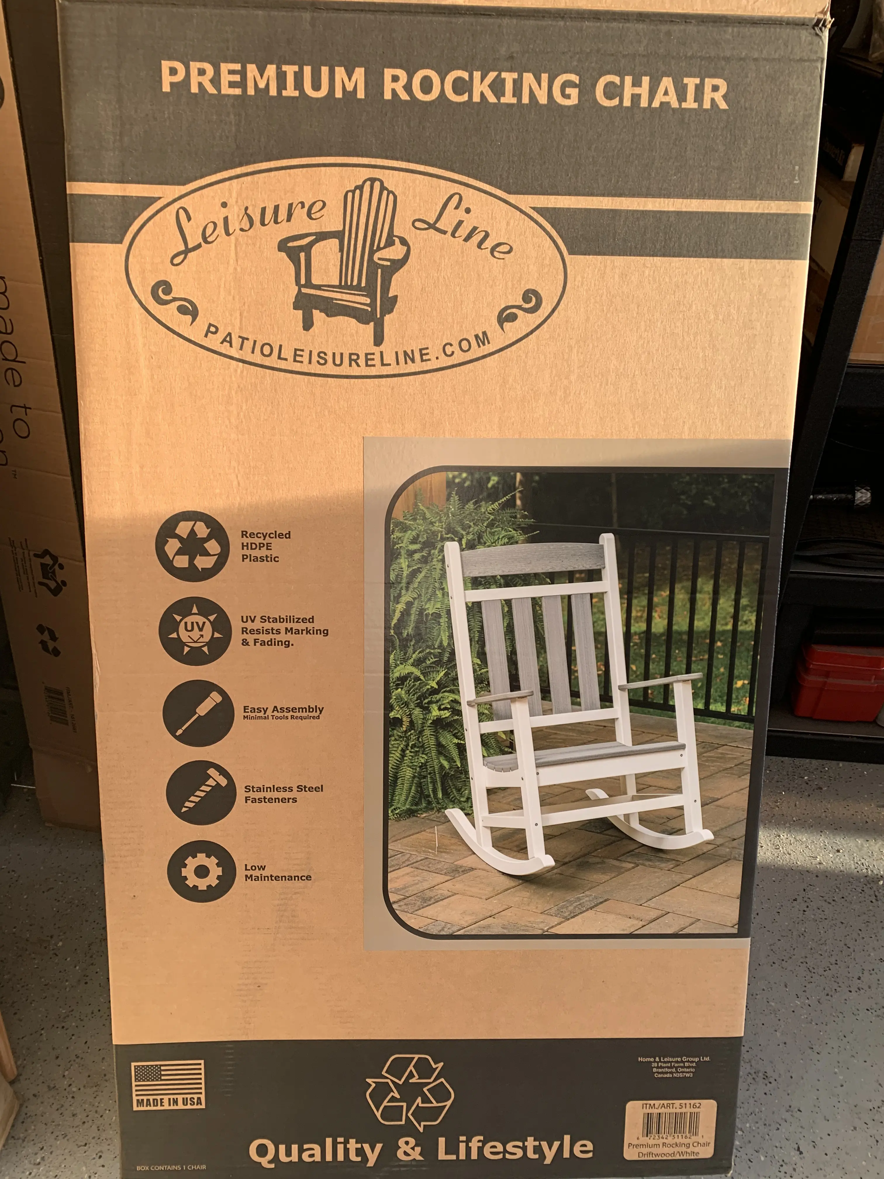 Rocking chair still in its shipping box before a ModJobs helper assembled it